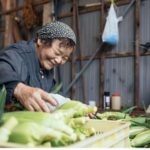 Japanese woman selling vegetables