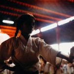 Karate class member in silhouette